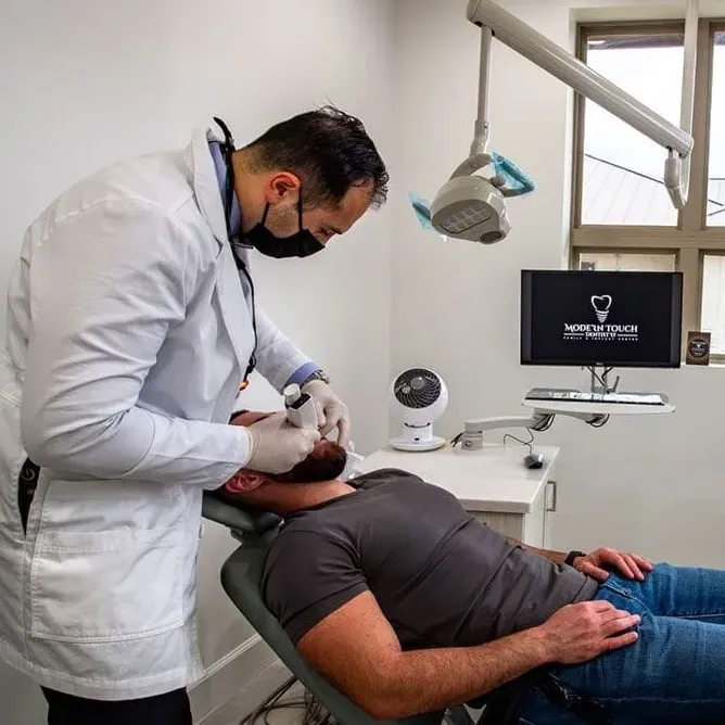 Dentist with a patient